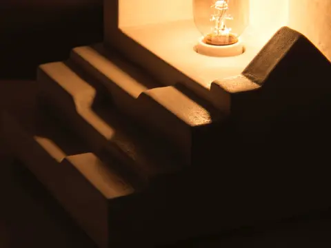 The Stars Are Not Jewels But Endless Fire — Plaster, electric wiring, incandescent lightbulb - 4x4x5", 2026 (5 of 6)